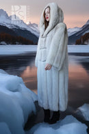 Hooded plush long coat with straight silhouette, textured cuffs, and side slit opening