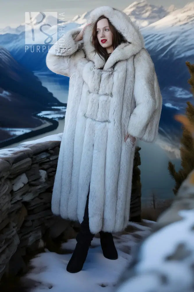 Long hooded plush fur coat with raised hood and front belt-like strap detail