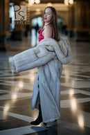 Hooded plush faux fur coat in pale blue, front view with flared hem and thick sleeves