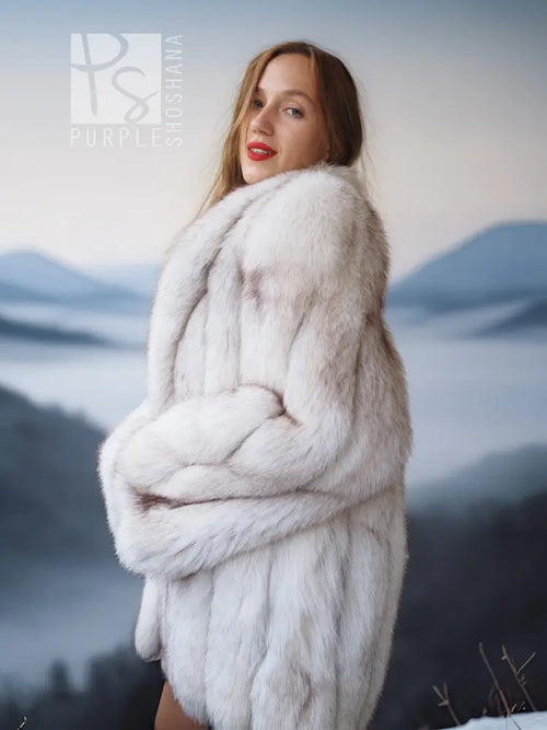 Pale white fox fur shawl-collar coat, close-up of shoulder and collar