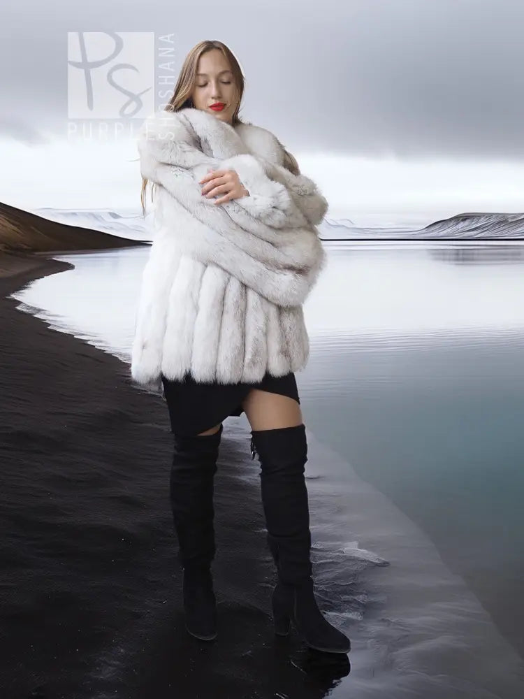 White faux fur shawl-collar coat, thick fur panels and voluminous cropped fit.