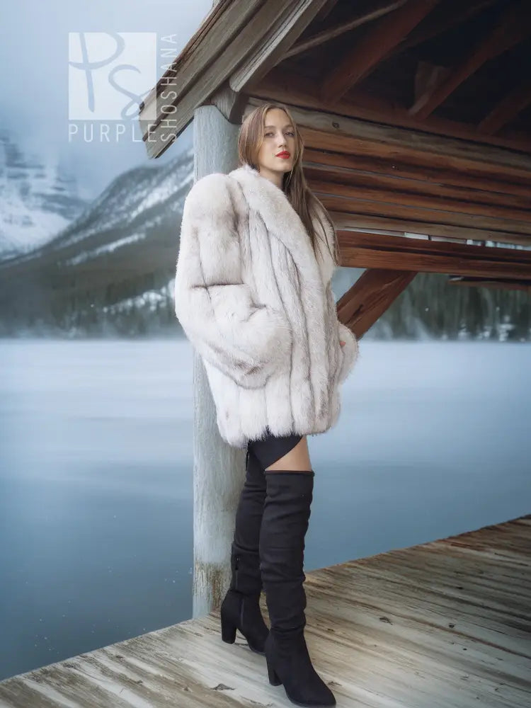 Pale white fox fur coat with shawl collar, side view with draped sleeves