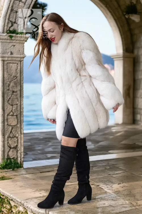 Ivory faux fur jacket with fluffy shoulders and long sleeves, open front