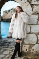 White plush fur jacket with long sleeves and open front, full-length view