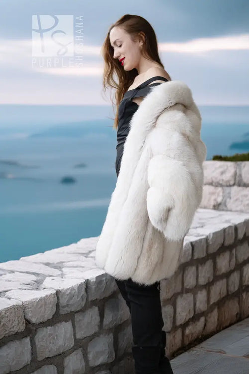 Ivory plush faux fur jacket with textured sleeve and high neckline