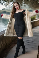 Ivory faux mink coat draped over shoulders with open front and wide collar