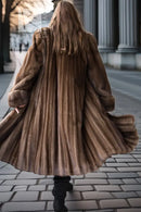 Brown mink swing coat, back view, full swing hem and long sleeves