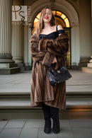 Tan mink swing coat with wide shawl collar, long sleeves