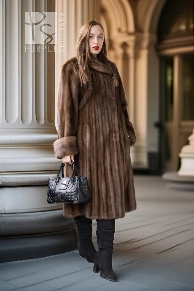 Brown mink swing coat with button front, swing hem, and fur trim cuffs