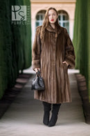 Brown mink swing coat with buttoned front and stand collar