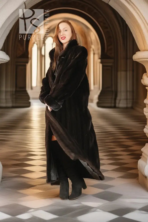 Black mink coat front view with deep collar and open, flowing silhouette