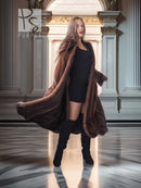 Dark brown hooded mink swing coat with swing hem over black dress and boots