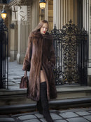Dark brown hooded mink swing coat with voluminous skirt and long sleeves