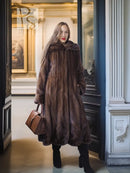 Dark brown mink swing coat with hood, button detail, and long sleeves