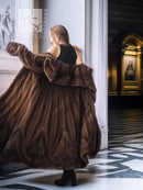 Dark brown mink swing coat with oversized fur collar, side view