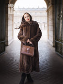 Dark brown hooded mink swing coat with full length and swing hem