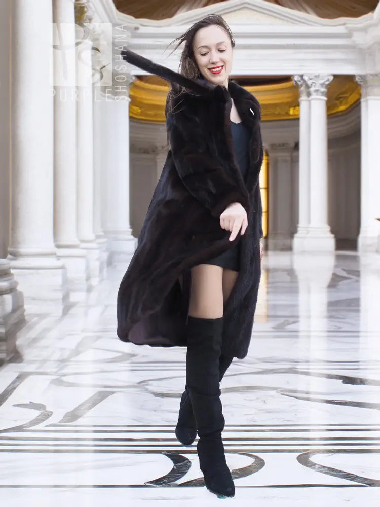 Vintage mink fur coat with tie belt and dark fur, three-quarter pose