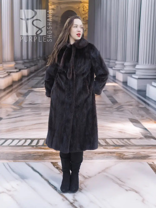 Vintage mink fur coat with full swing hem and wide collar, dark color
