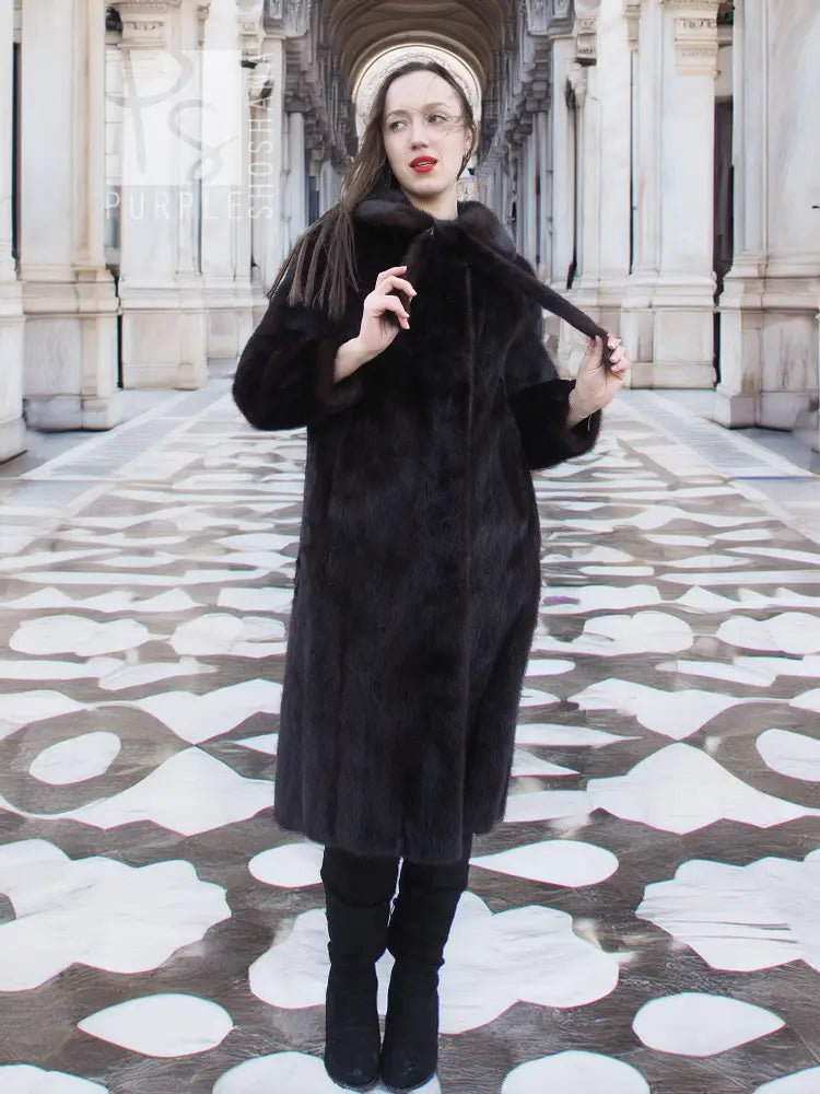 Long mink fur coat with wide collar and buttonless front, dark color