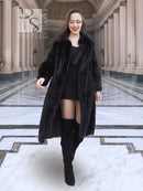 Long mink fur coat with plush collar and relaxed fit, dark color, walking view