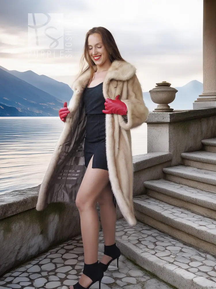 Golden pearl mink fur coat in light cream with wide fur collar and open front, knee length.