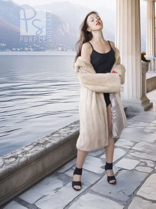 Golden Pearl mink fur coat, cream tone, open front with long sleeves.