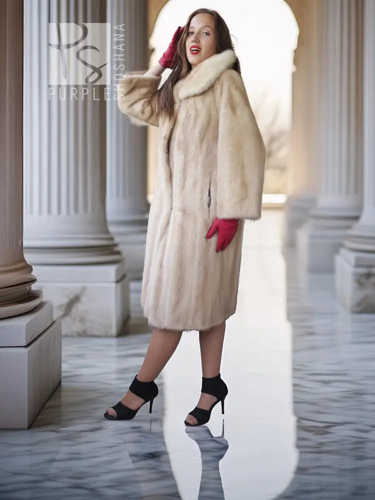 Golden pearl mink fur coat in light cream with wide fur collar, knee length, button closure.