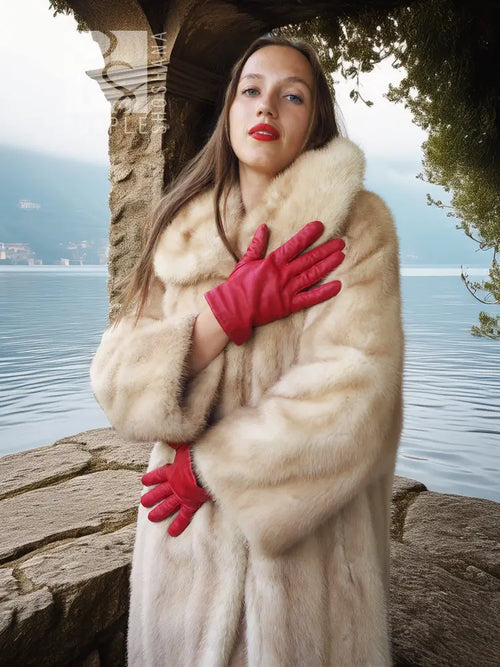 Golden Pearl mink fur coat with wide shawl collar, cream tone, long sleeves.