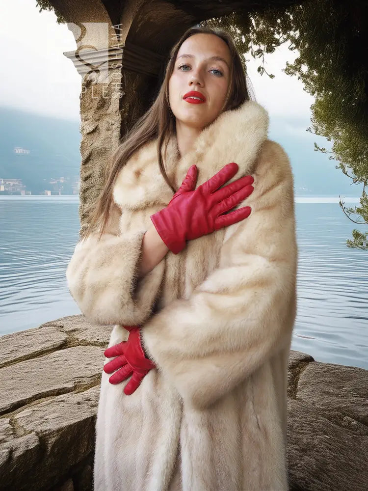 Golden Pearl mink fur coat with wide shawl collar, cream tone, long sleeves.