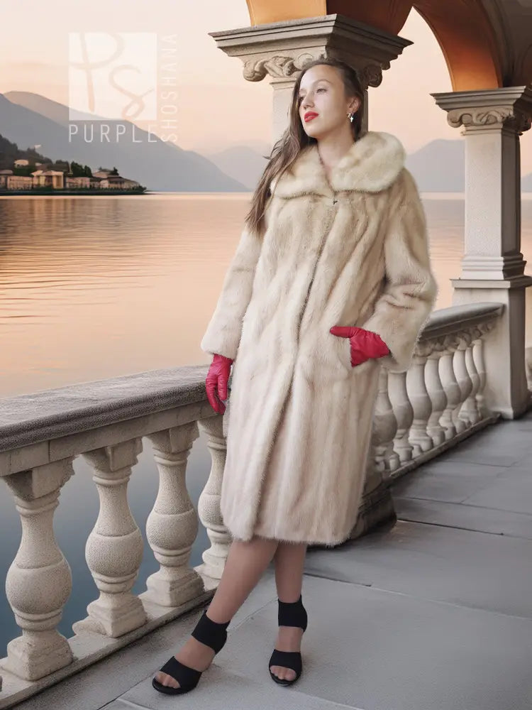 Golden pearl mink fur coat in light cream with wide fur collar and knee length.