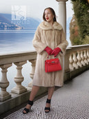 Golden Pearl mink fur coat with shawl collar, cream tone, long sleeves.