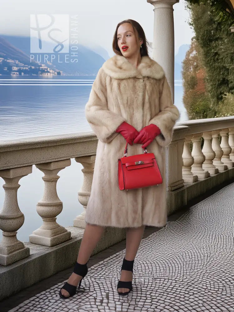Golden Pearl mink fur coat with shawl collar, cream tone, long sleeves.