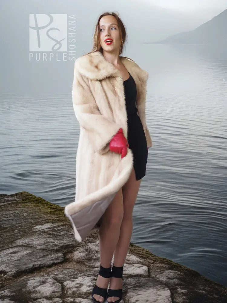 Golden Pearl mink fur coat with soft cream fur and shawl collar, long sleeves.