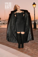 Black reversible outer layer of mink coat with long drape and open front, sleeved.