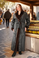 Reversible mink coat with dark charcoal exterior, long length, belted waist and open collar