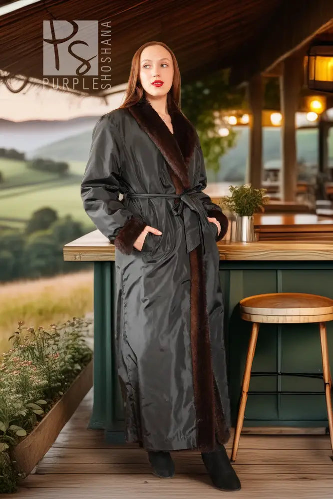 Reversible mink coat with dark charcoal exterior, long length, belted waist and open collar