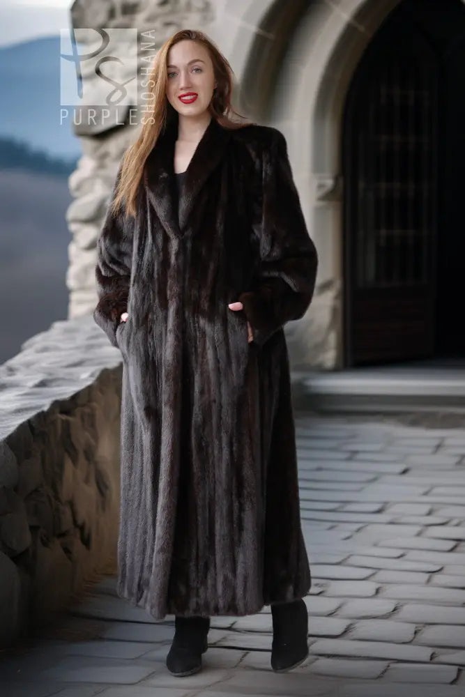Black mink coat with notched collar, long front and full-length hem