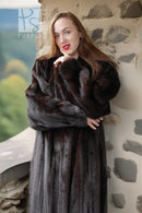 Black mink fur coat with thick fur texture and a high, wrap-like collar