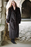 Long black mink fur coat with a deep V neckline and side pockets