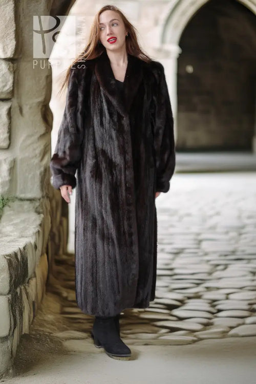 Long black mink fur coat with a deep V neckline and side pockets