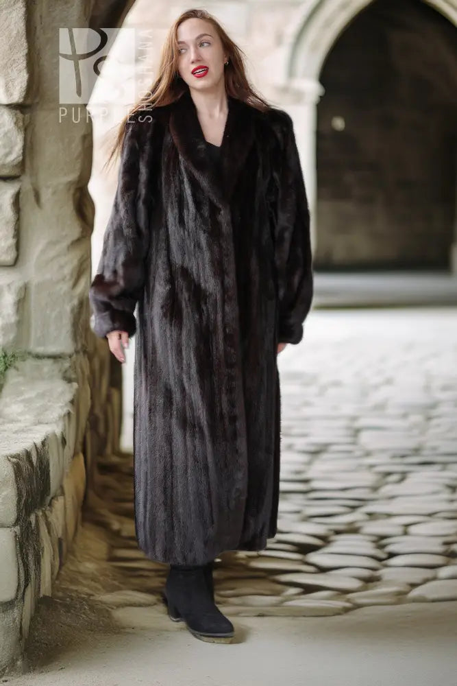 Long black mink fur coat with a deep V neckline and side pockets