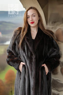 Long black mink fur coat with thick fur texture and a V neckline