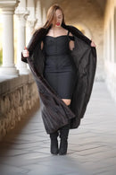 Dark mink fur coat, hooded style with draped front and long wide sleeves, beltless
