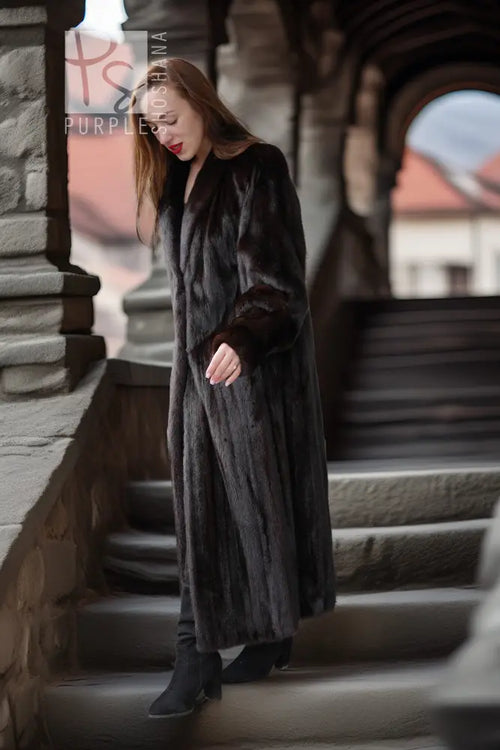 Black mink coat, three-quarter view on stone steps, open front and long sleeves