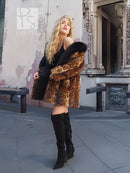 Leopard-print fur coat with black fox-fur collar, open front styling, knee-length
