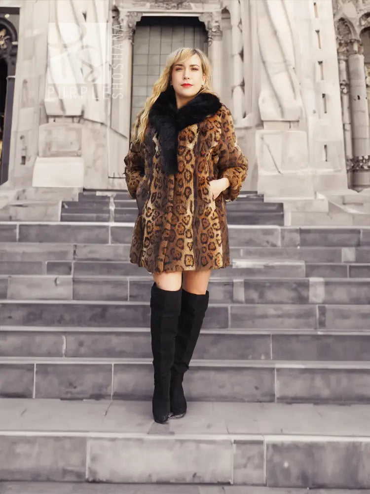 Leopard-pattern fur coat featuring a thick black fox-fur collar and short skirt length