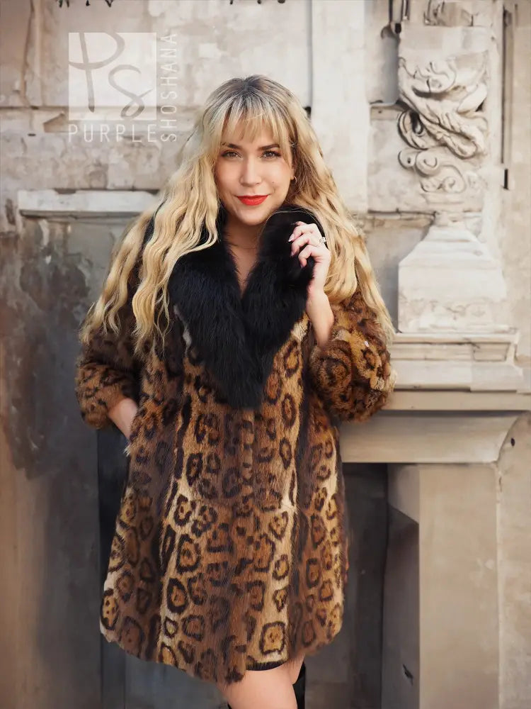 Leopard-print fur coat with black fox-fur collar, close front view, warm brown pattern