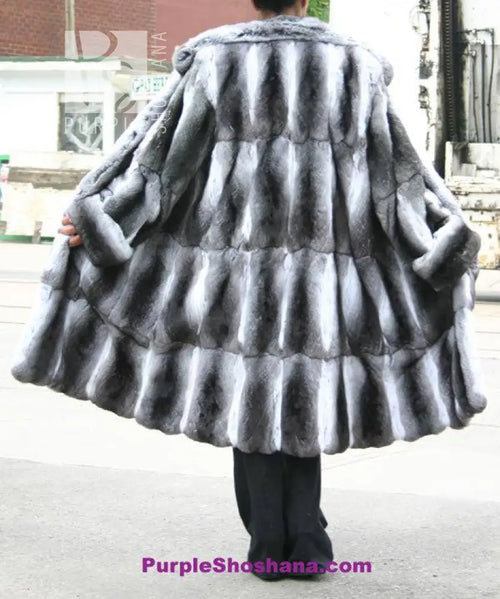 Chinchilla fur coat back view with rounded cape shoulders and flared hem