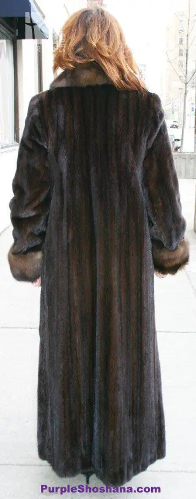 Women’s dark brown mink fur coat, back view, long length with wide collar.