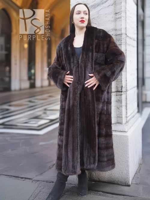Dark brown mink fur coat with horizontal stripe pattern and tuxedo-style front